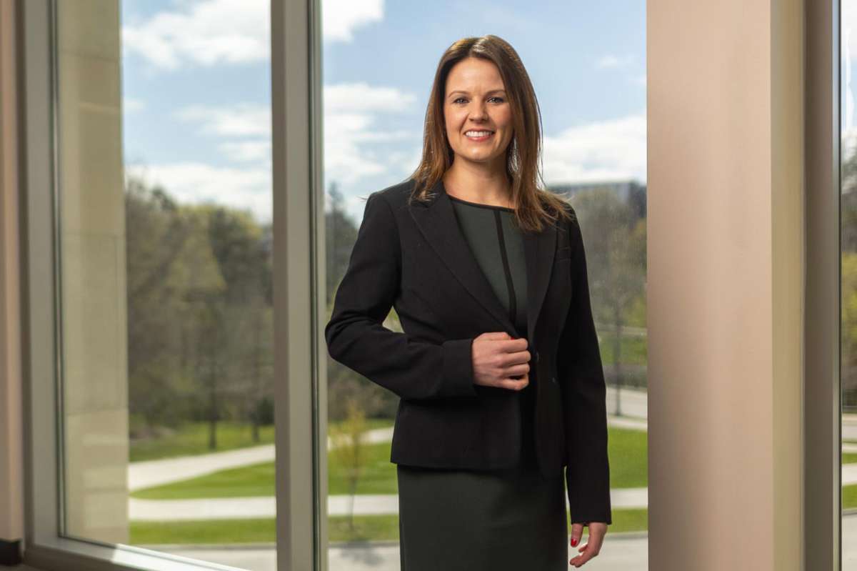 Professional woman in front of window